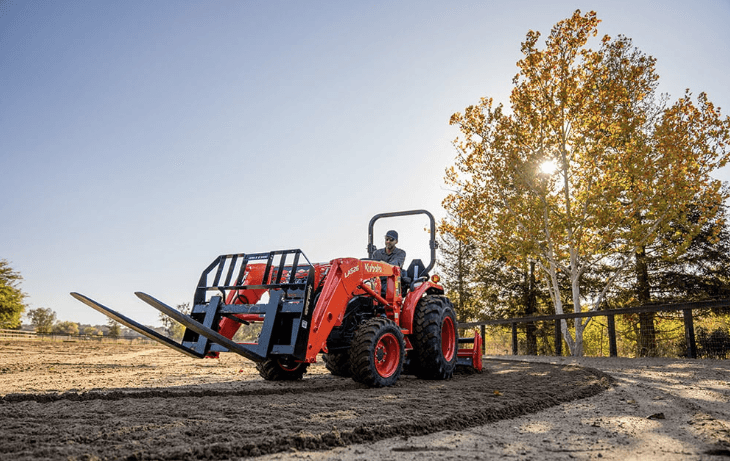Man operating the Kubota L3902 Tractor