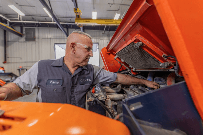 Technician working on equipment